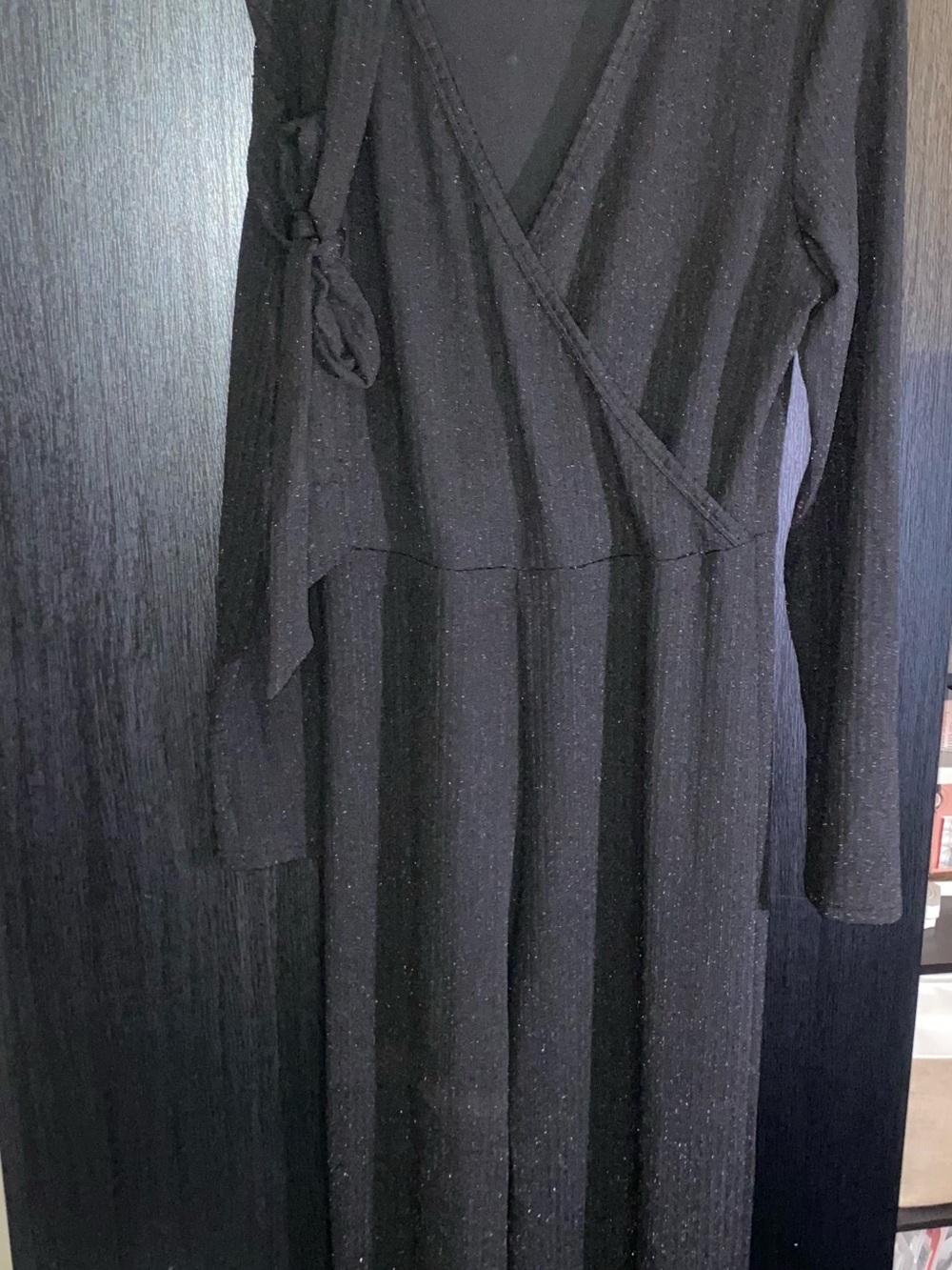 Black Long-Sleeve Wrap jumpsuit with Subtle Sparkle